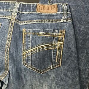 448.  Cowgirl up Boot Cut Jeans- altered length